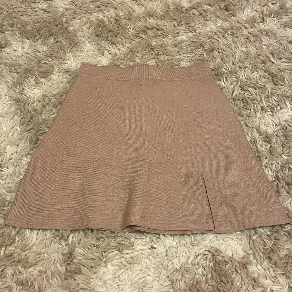 NWT. High waisted skirt. Size small. Great condition.